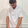 T-shirt con dettagli BRILLANTINATI